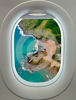 Plane window Aerial view of a Beach Phuket Thailand