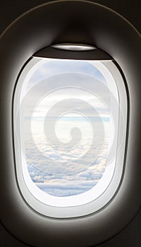 Plane window with cloud view