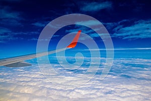 Plane Wing on Cloudscape background