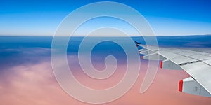 Plane wing and sky with copyspace, panoramic view