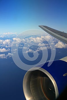 Plane Wing with sky and ocean background