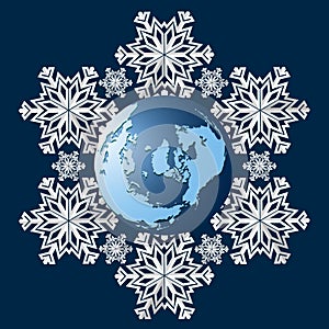 Planet Earth on a background of snowflakes, a symbol of the coming winter.