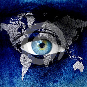 Planet earth and blue human eye