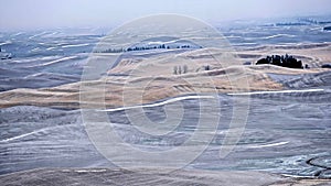 Planet Earth. Farmlands on rolling hills covered with frost and snow in winter.