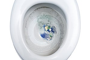 Planet earth is flushed with a lot of drinking water into a toilet bowl, waste of environmental resources and water saving concept