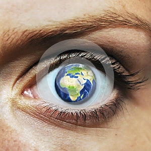 Planet earth in human eye