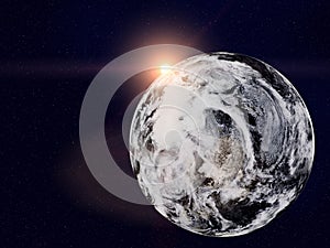 Planet earth in outer space with lens flare of sun