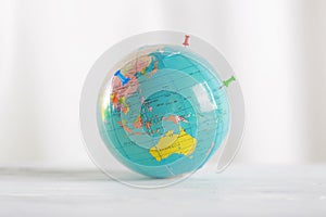 Planet Earth and pins. Earth globe and colorful map labels.