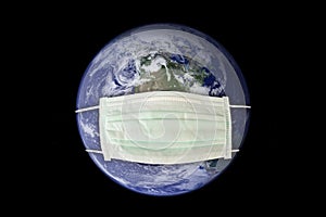 Planet earth sick wearing a surgical mask. New coronavirus, covid-19 worldwide epidemic crisis concept