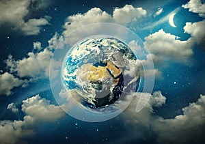 Planet Earth surrounded by clouds, the moon and stars in the night sky. Fantasy  collage on travel, geography, space, science and