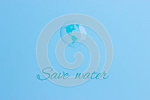 Planet earth in a water drop