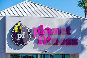 Planet Fitness sign on the fitness club. Planet Fitness is American franchisor and operator of fitness centers