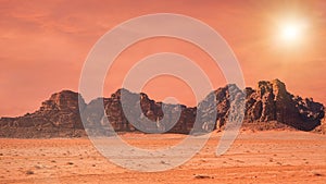 Planet Mars like landscape - Photo of Wadi Rum desert in Jordan with red colour filter and added sun, this location was used as