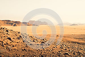 Planet Mars like landscape - Photo of Wadi Rum desert in Jordan with red pink sky above, this location was used as set for many