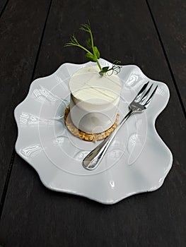 Planifolia Vanilla cake on white plate and a little fork