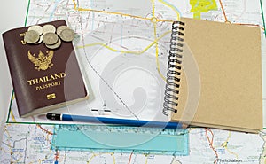 Planing travel with passport textnote and map