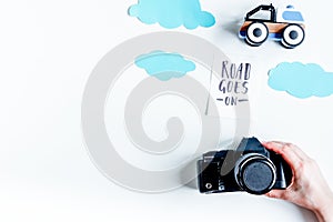 Planing trip with child with photo camera white background top v