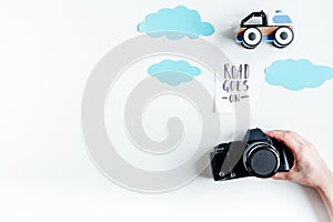 Planing trip with child with photo camera white background top view space for text