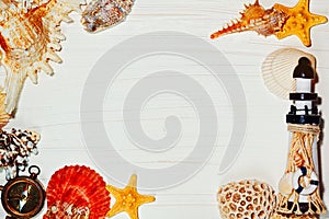 Plank background with sea shells and lighthouse