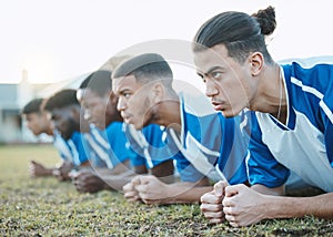 Plank, sports group and soccer team on field for fitness training, workout or exercise outdoor. Football player, club