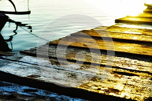 planks lined up from the floor of the west pier on serangan island