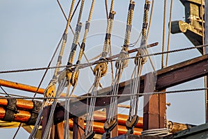 Planks, ropes, pulleys, tackle, and rigging of a replica of a 1400's era sailing ship