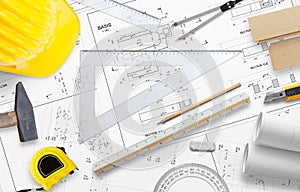 Planning business building. On the table are a ruler, pencil and other construction accessories