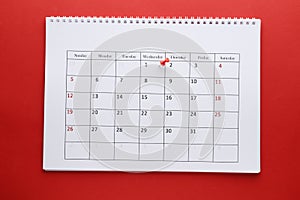 Planning calendar with pin 1Ñ… On a red background. Important date. Place for text.