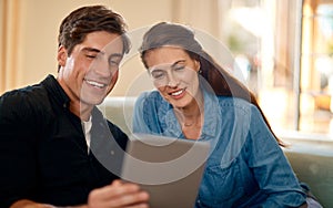 Planning, couple and tablet to research in home with ideas for property, development or real estate. Mortgage, loan and