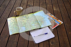 Planning a holiday with road maps. photo