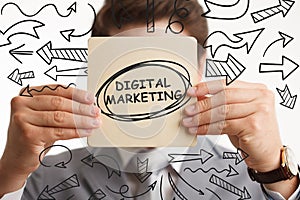 Planning marketing strategy. Business, Technology, Internet and network concept. Young businessman shows the word: Digital