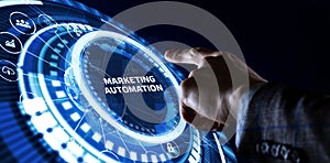 Planning marketing strategy. Business, Technology, Internet and network concept. Young businessman shows the word: Marketing