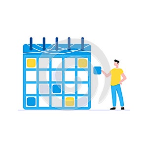 Planning time management business concept. Man standing near calendar planner
