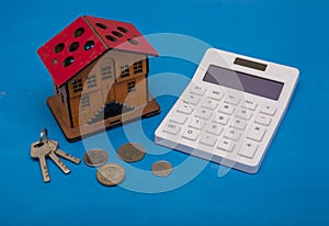 Planning to build your dream home concept with calculator and coins