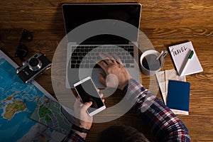 Planning travel map tea laptop map on the desk