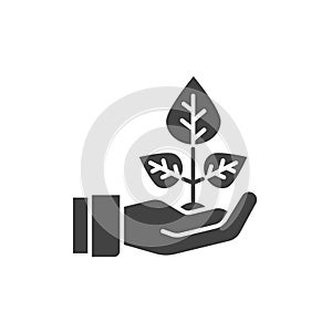 Plant based black glyph icon. Label for cosmetic natural product sign. Hand holding herb. Environment protect. Pictogram for web