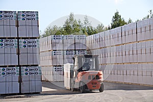 Plant of building materials `ECO` Yaroslavl.The forklift works on the territory of production