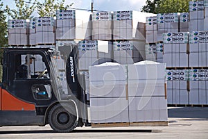 Plant of building materials `ECO` Yaroslavl.The forklift works on the territory of production