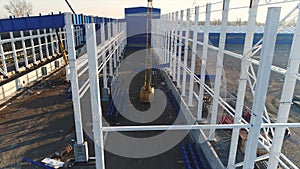 Plant Construction, Construction of a large factory, Industrial exterior, Construction site, aerial view, metal and