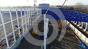 Plant construction, construction of a large factory, industrial exterior, construction site, aerial view, metal and