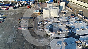 Plant construction, construction of a large factory, industrial exterior, construction site, aerial view, metal and