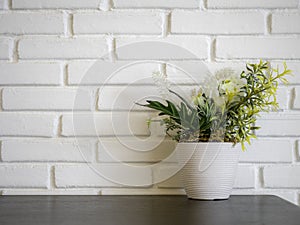 Plant and flower mock-up in white flowerpot