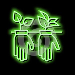 plant growing from gloves neon glow icon illustration