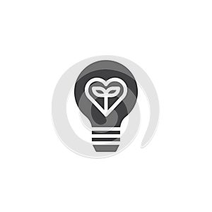 Plant growing inside the light bulb vector icon