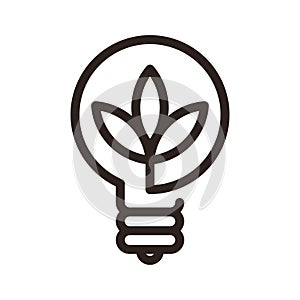 Plant inside lightbulb. Concept of green energy and environmental