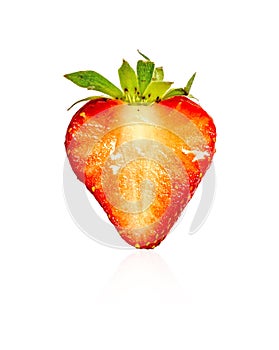 Plant part of a fresh berry fruit, half red strawberry sliced isolated on white background, die cut with clipping path