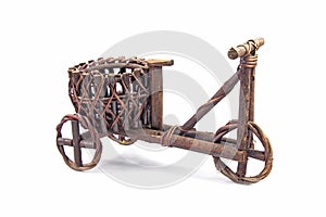 Plant pot made from dark brown wood in Bicycle shaped vintage style for decoration garden and home isolated on a white background