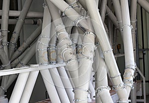 Plant for the production of food flour, a lot of metal pipes through which food flour passes, breadstuffs