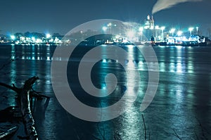 Plant on the river at night