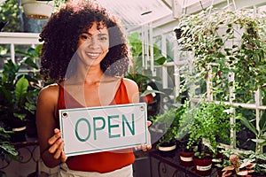 Plant shop, open sign and portrait of a woman with a small business standing in her retail nursery. Happy, smile and